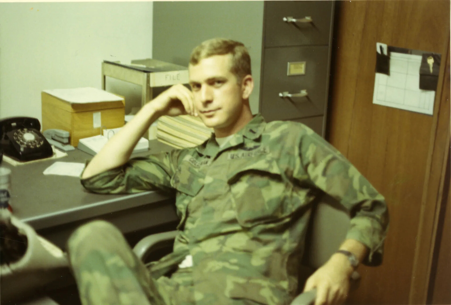 U.S. Air Force Airman Relaxing in Squadron Office, ERDL Camouflage BDUs