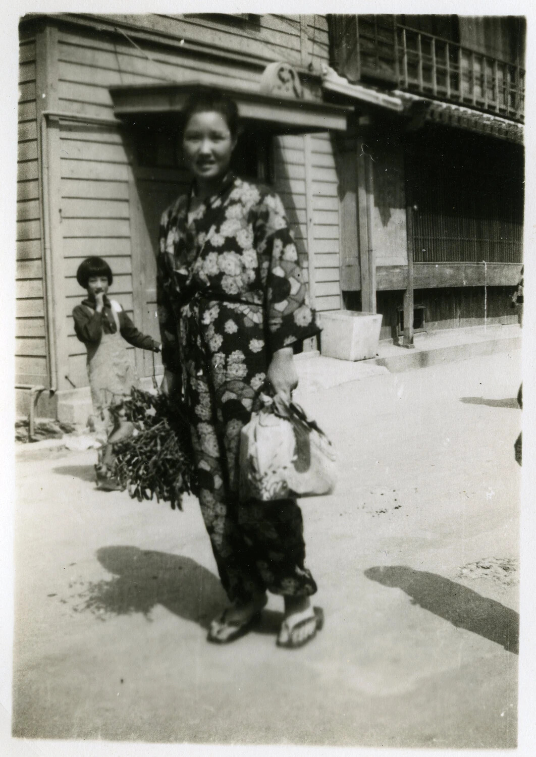 Japanese Woman with Vegetables on a Street, Occupied Japan