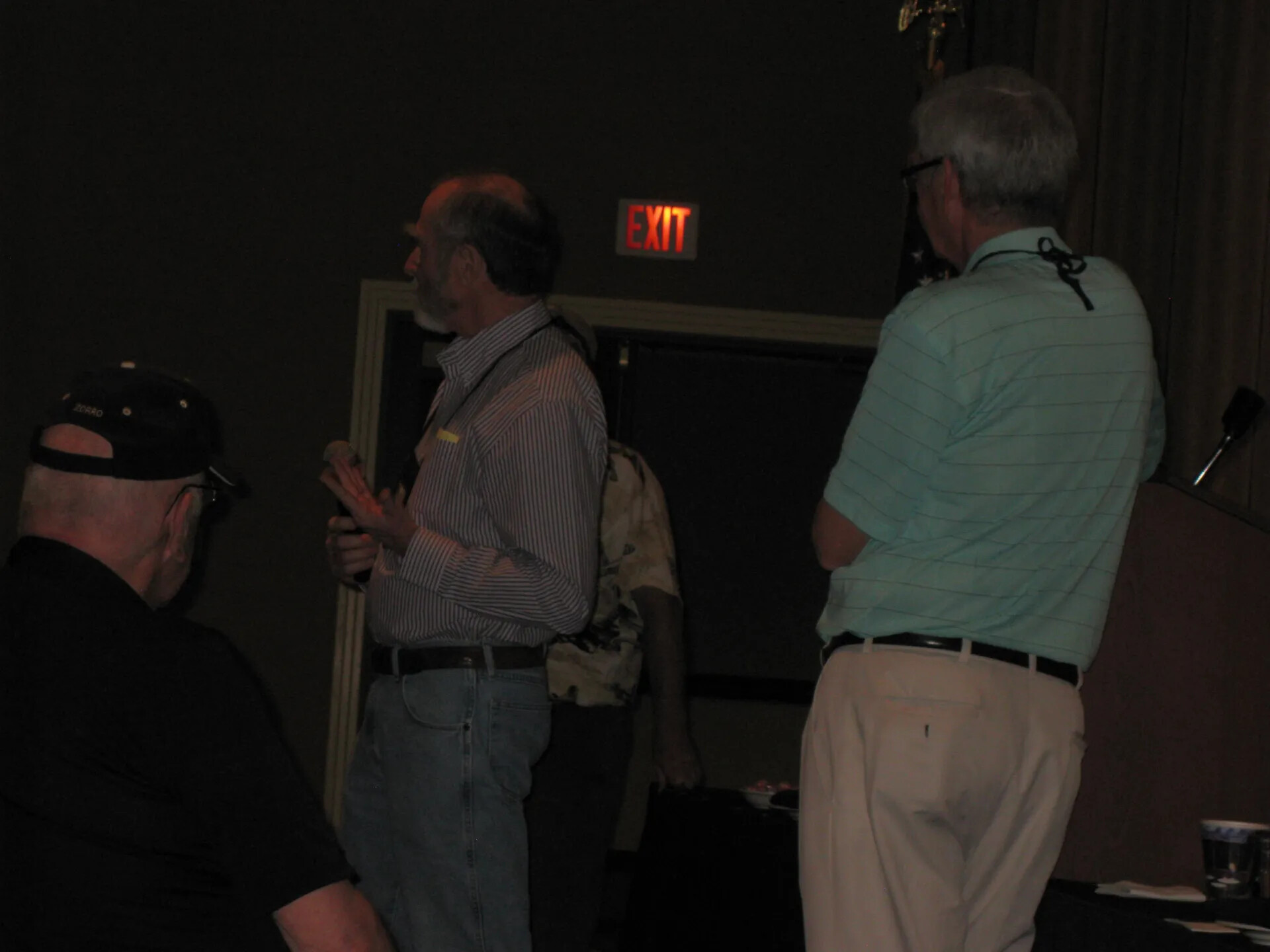 Speaker with Handheld Microphone and Attendee Wearing a ZORRO Ballcap, Special Operations Association Reunion XXXVII, Las Vegas, 2013