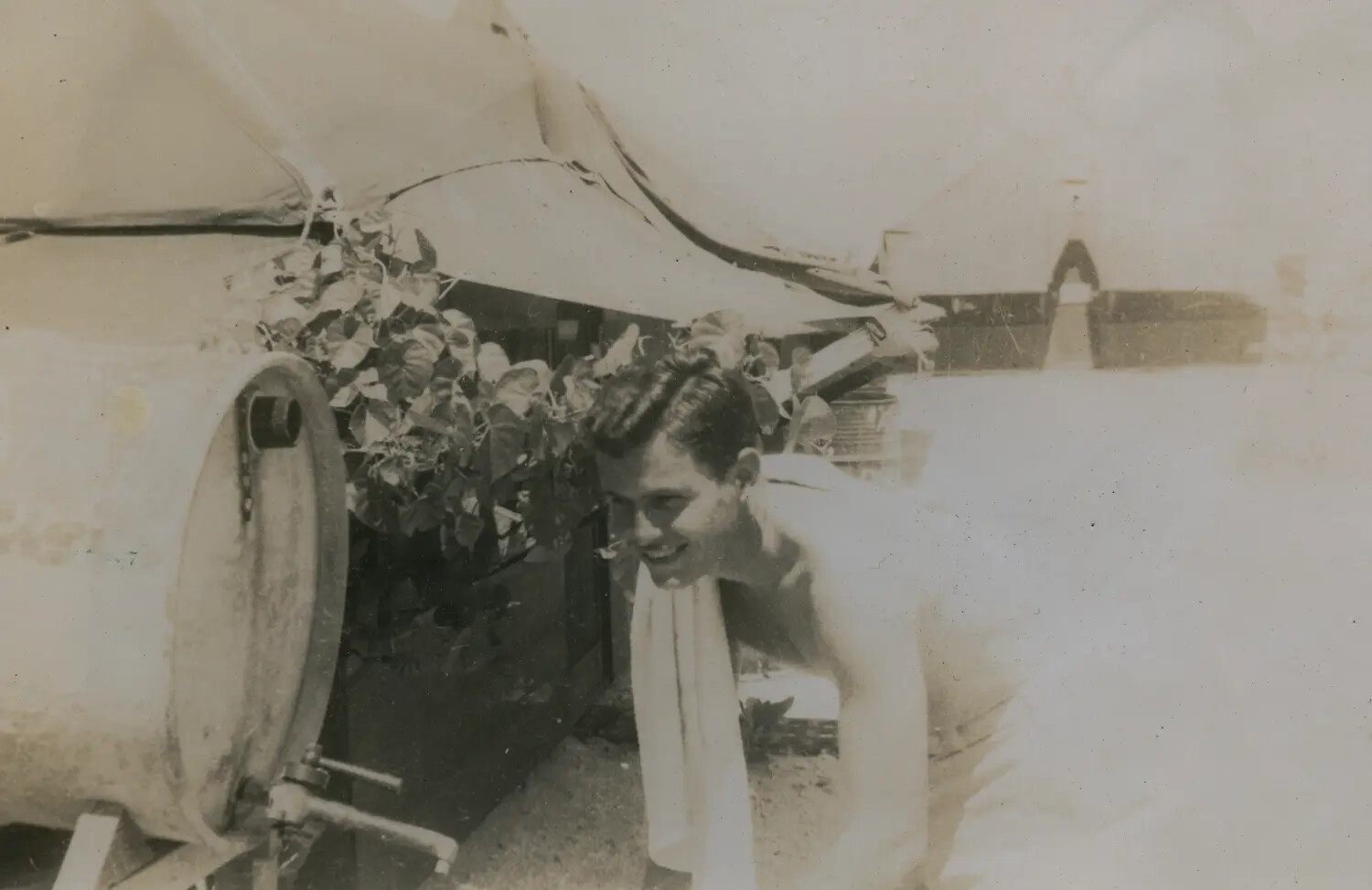 Serviceman with Towel at Camp Tent, WWII