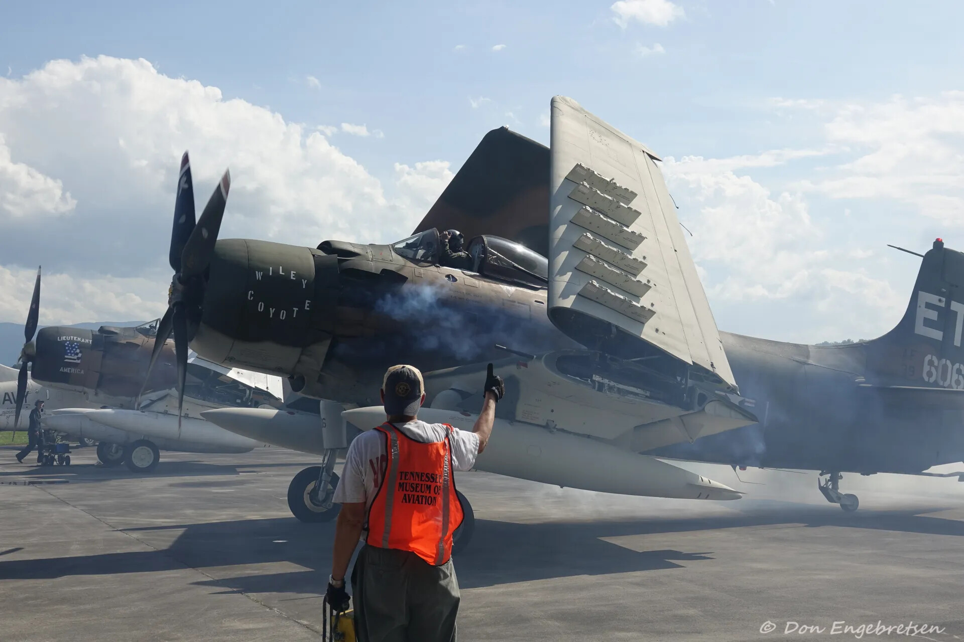 A-1 Skyraider 'Wiley Coyote' with Ground Marshaller, Tennessee Museum of Aviation Event, 3-4 May 2019