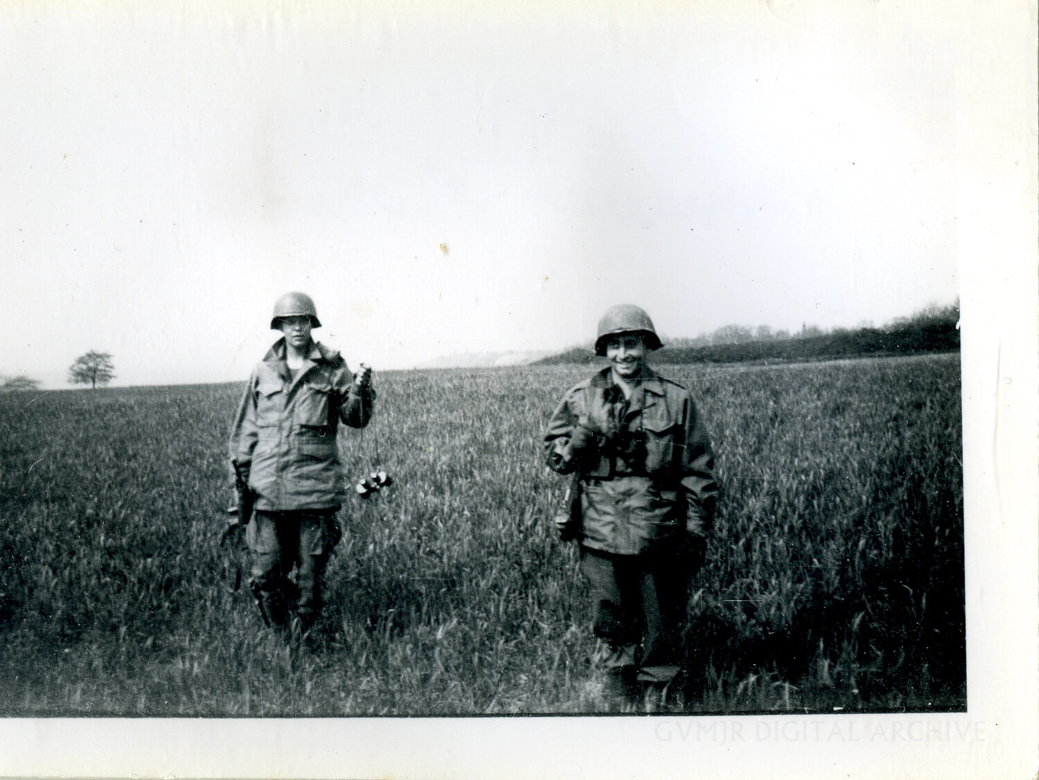 Two Paratroopers Walking Through a Field with Flowers, European Theater