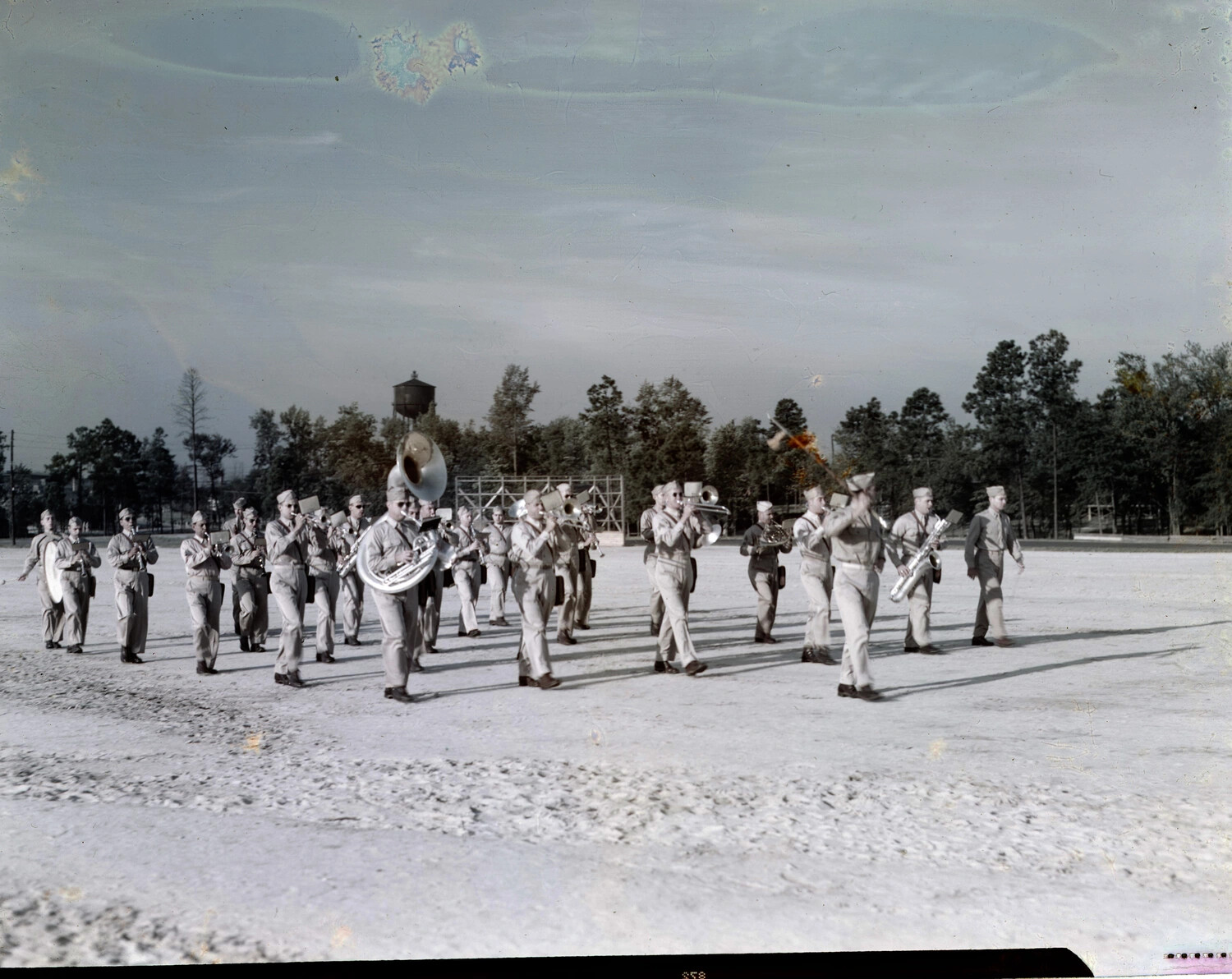 U.S. Army Marching Band on Snow-Covered Drill Field, WWII (Damaged Negative)