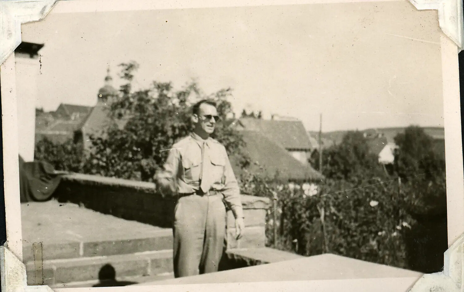 Serviceman on a Rooftop Terrace Overlooking a European Town, WWII/Post-War Era