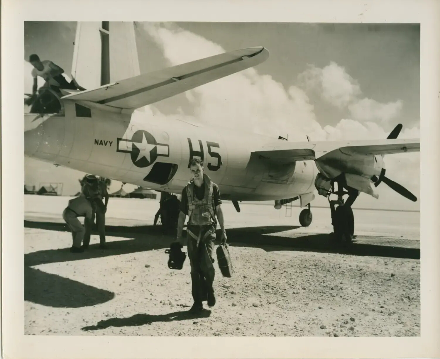 U.S. Navy Twin-Engine Aircraft 'H5' on Pacific Airstrip with Aircrew, WWII Era, USS Petrof Bay (CVE-80) Collection