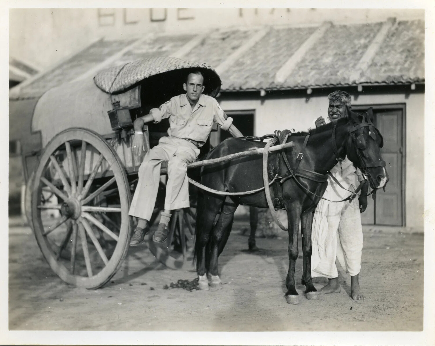 American Serviceman Riding in Horse-Drawn Tonga with Indian Driver, CBI Theater, World War II