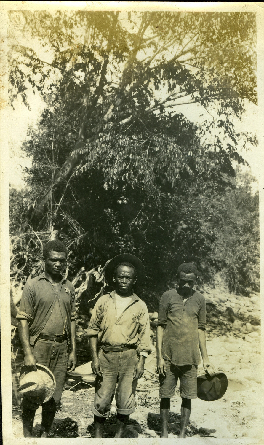 Three Filipino Men by a Dry Riverbed, Manila Photo Album