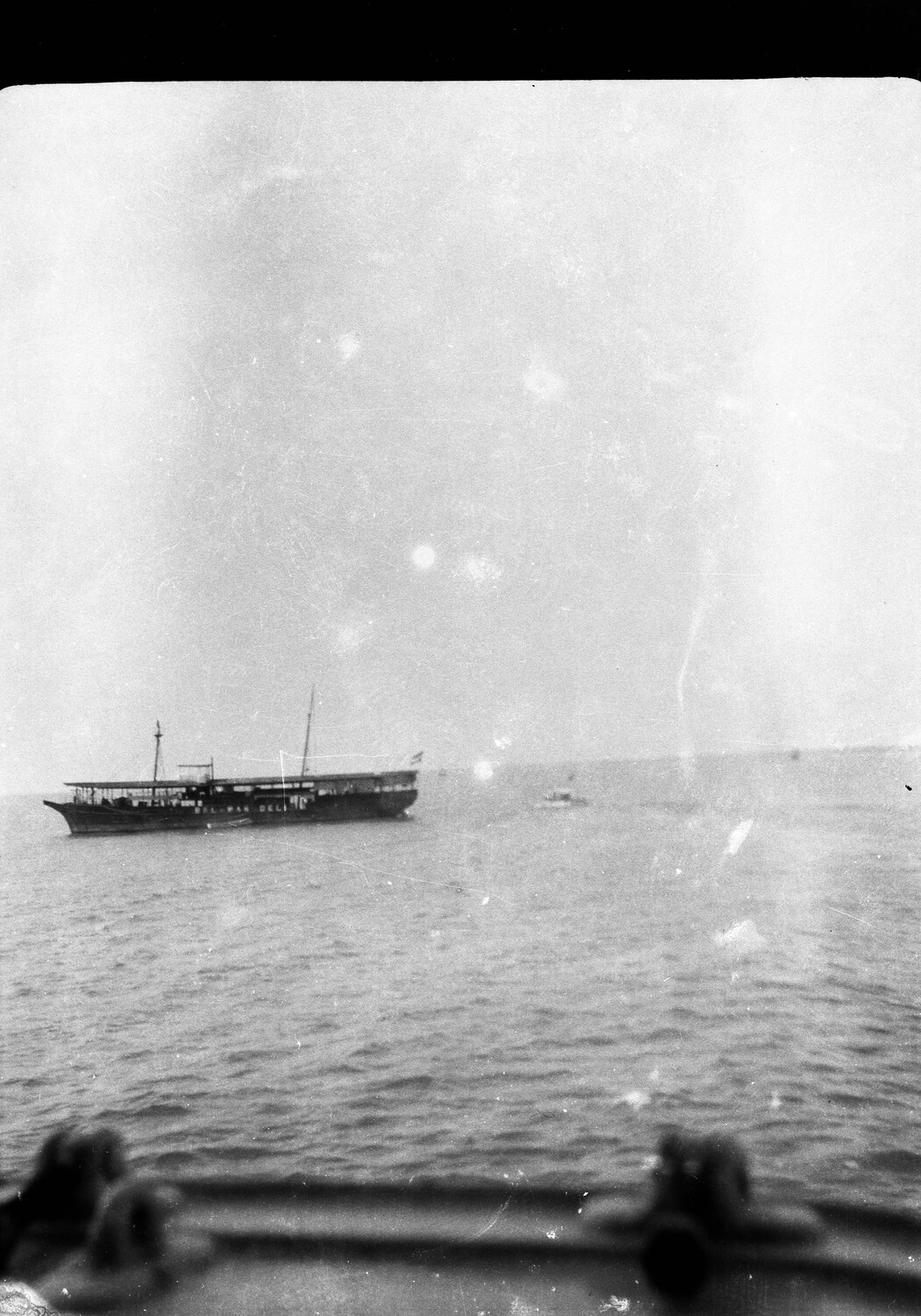 Small Coastal Trading Vessel at Anchor, China Station — US Navy Asiatic Fleet Snapshot, c. 1920s–1930s