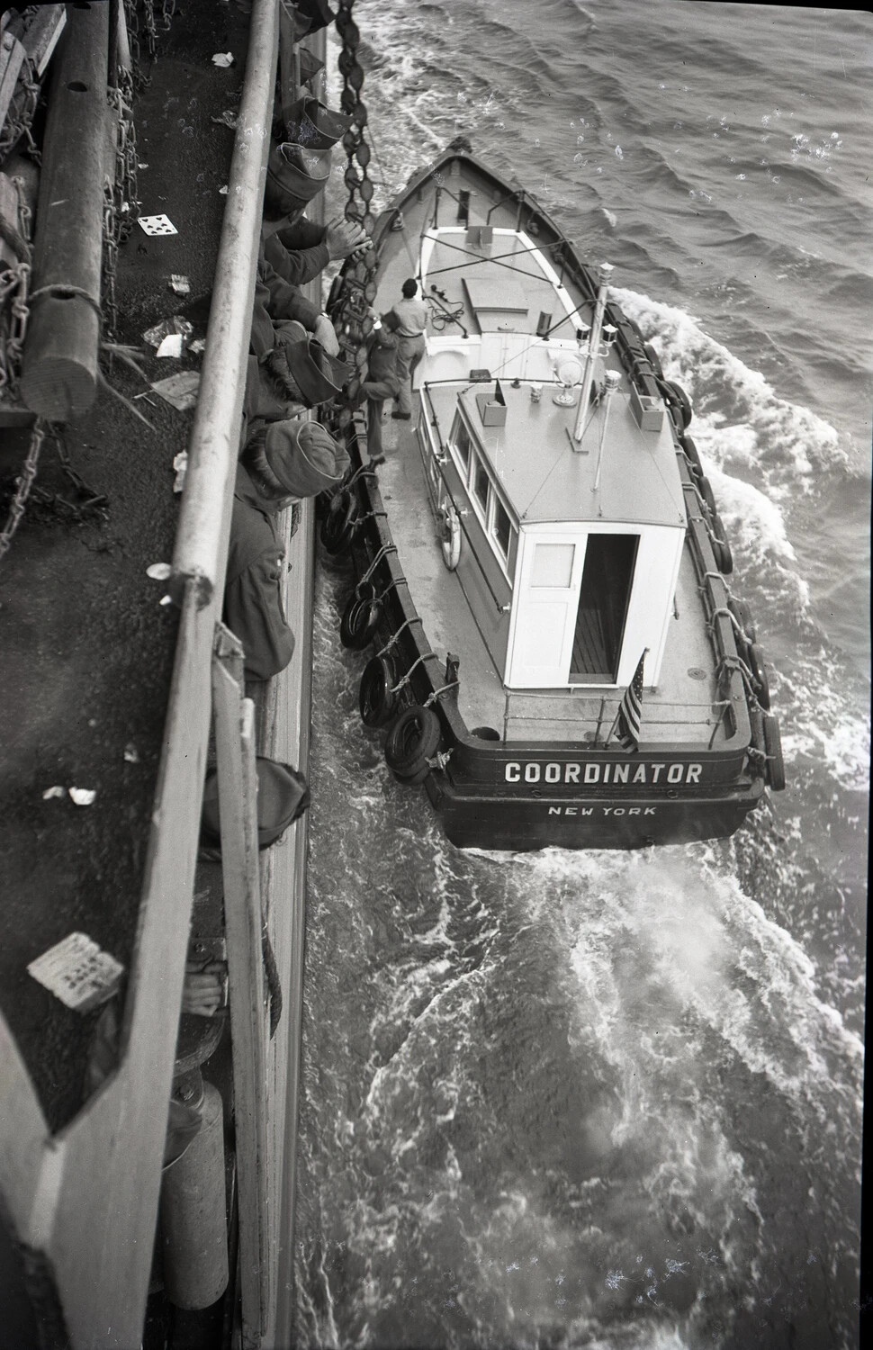 Harbor Tug 'Coordinator' of New York Assisting a Troopship, WWII Era