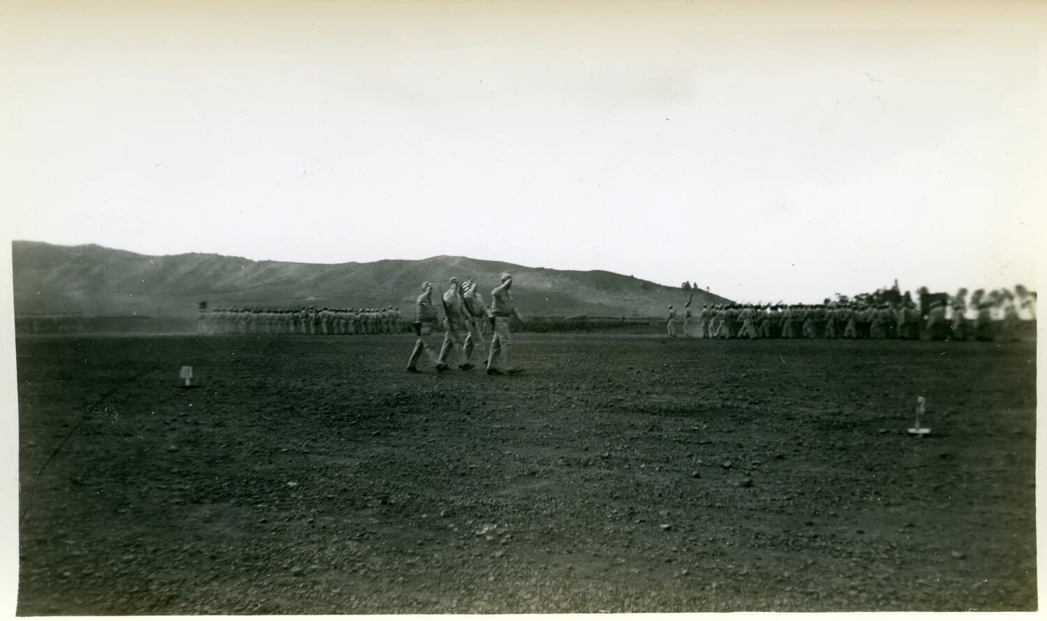 Troop Formations and Officers on Parade Ground