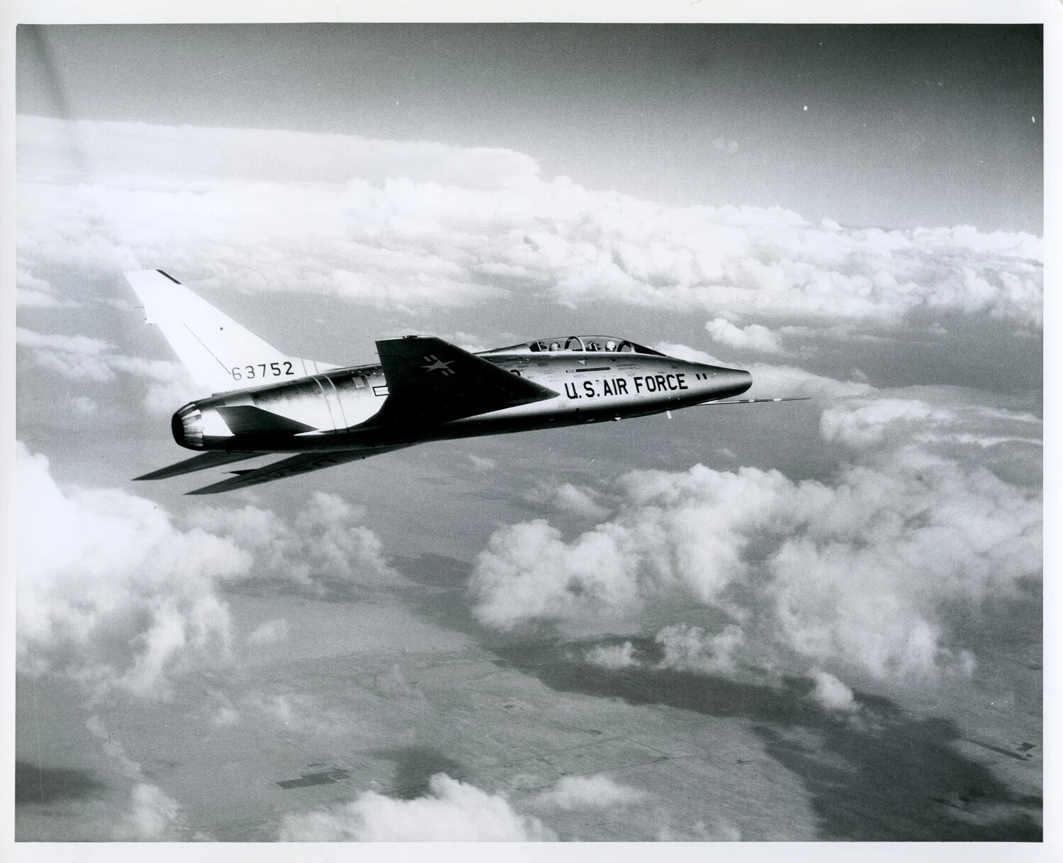 North American F-100F Super Sabre in Flight Above Clouds, USAF