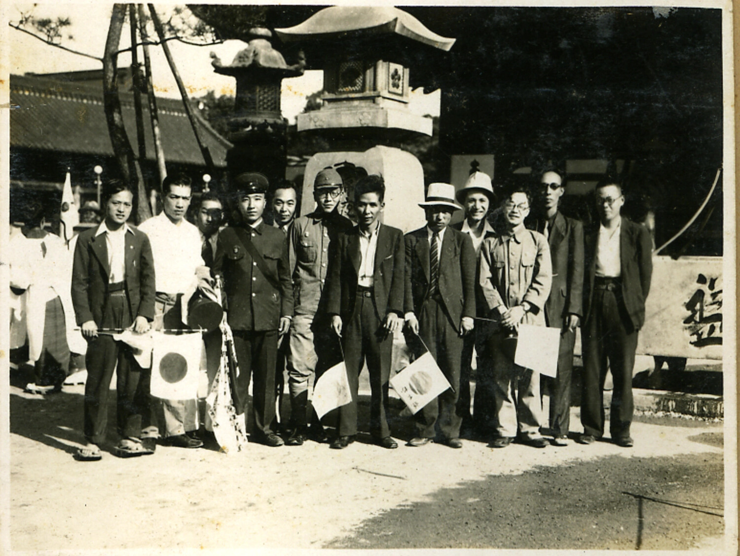 Group Portrait at a Shinto Shrine with Departing Soldier and Community Members
