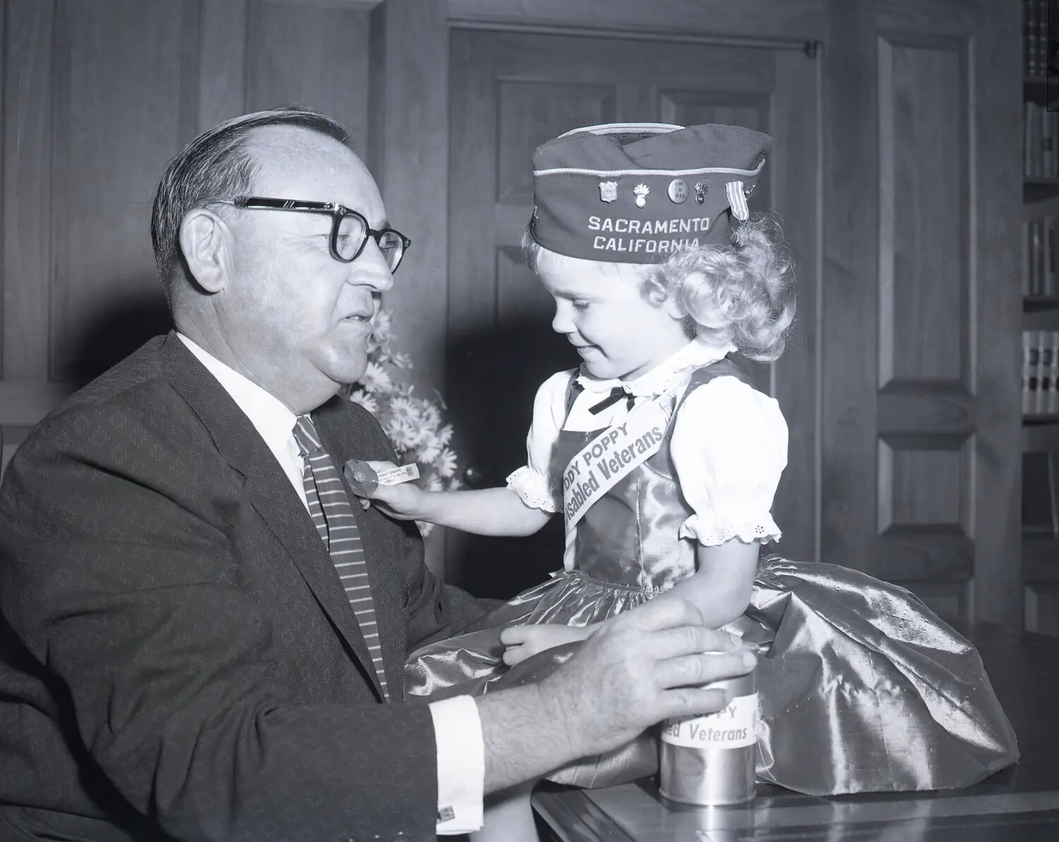 VFW 'Buddy Poppy' Campaign Presentation: Local Official and Child Poppy Volunteer, Sacramento, California