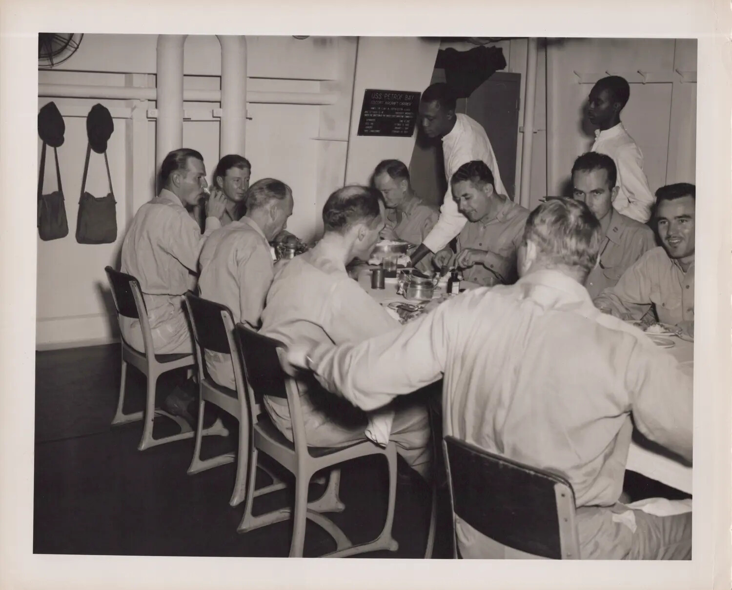 Officers Dining in the Wardroom Aboard USS Petrof Bay (CVE-80), WWII