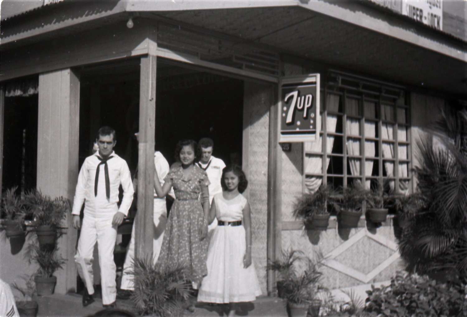U.S. Navy Sailors on Liberty with Local Companions, Philippines