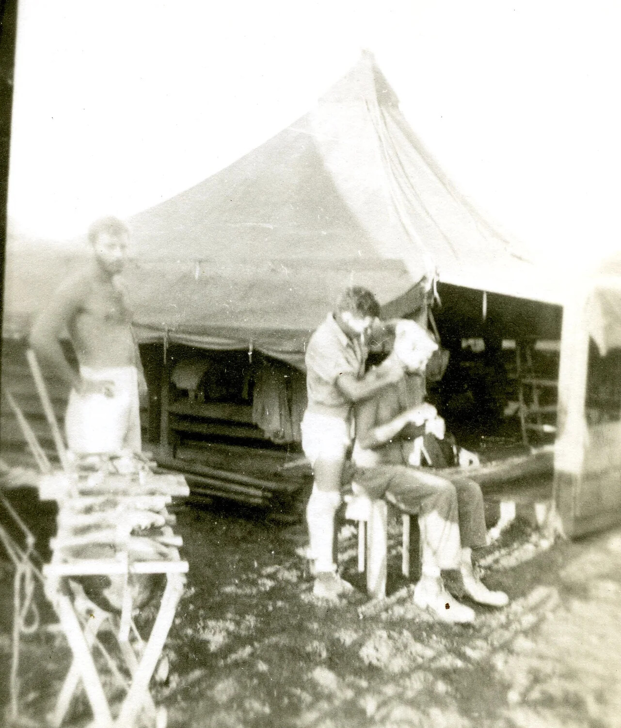 Field Haircut Outside Squad Tents (Third View), 345th Bomb Group Encampment, Ie Shima, WWII