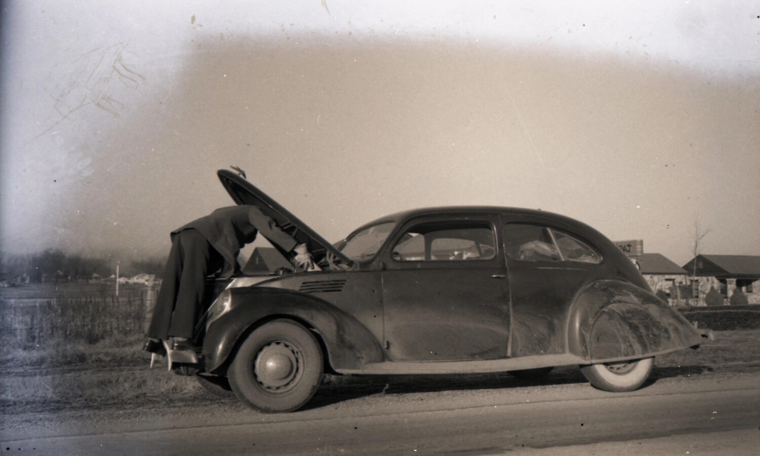 Roadside Engine Repair, Streamlined 1930s Sedan (Personal Snapshot, CBI Theater Collection)