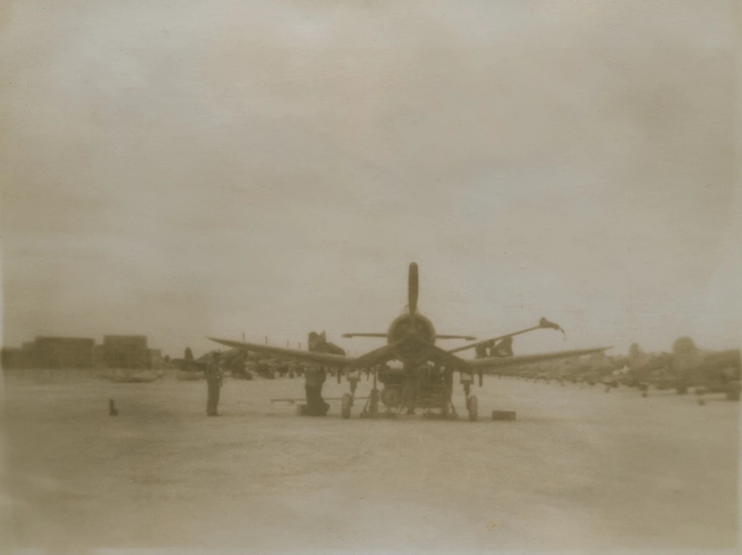 Ground Crew Servicing Carrier-Based Fighter Aircraft on Flight Line, Pacific Theater, WWII