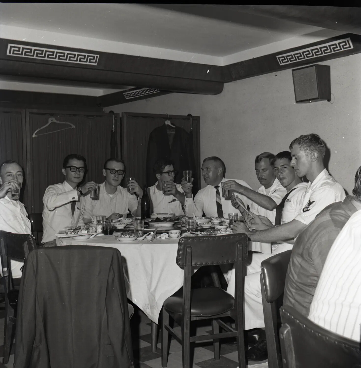 U.S. Navy Sailors Sharing a Meal Ashore During a Port Call, Vietnam War Era