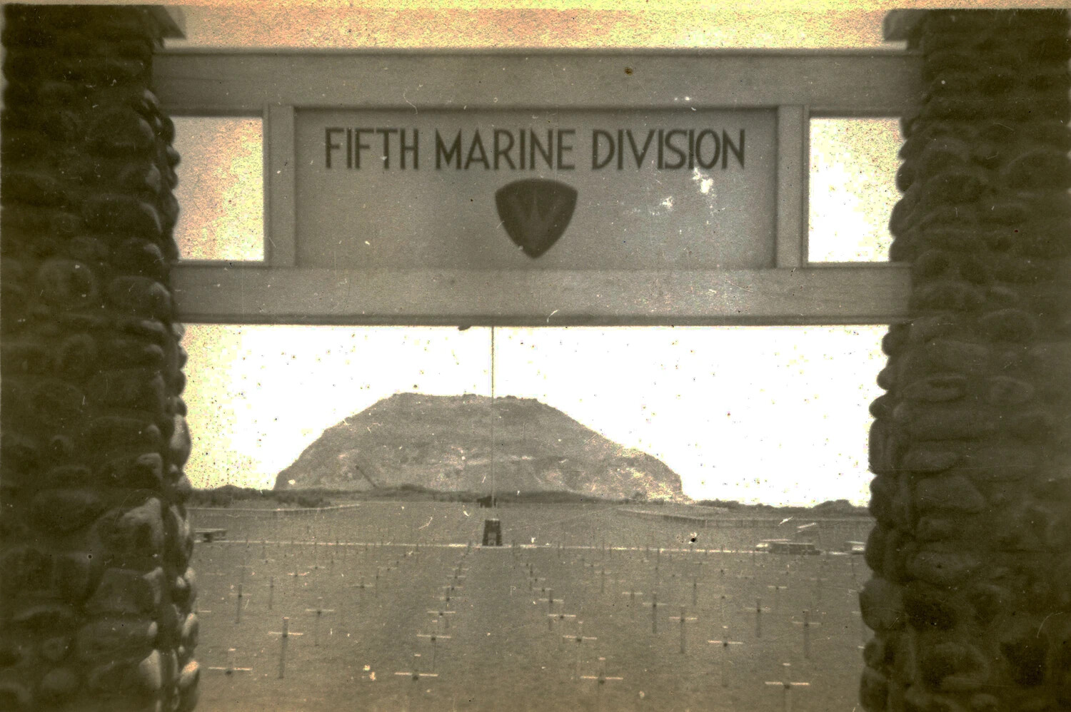 Entrance Gate to the Fifth Marine Division Cemetery with Mount Suribachi in Background, Iwo Jima, 1945