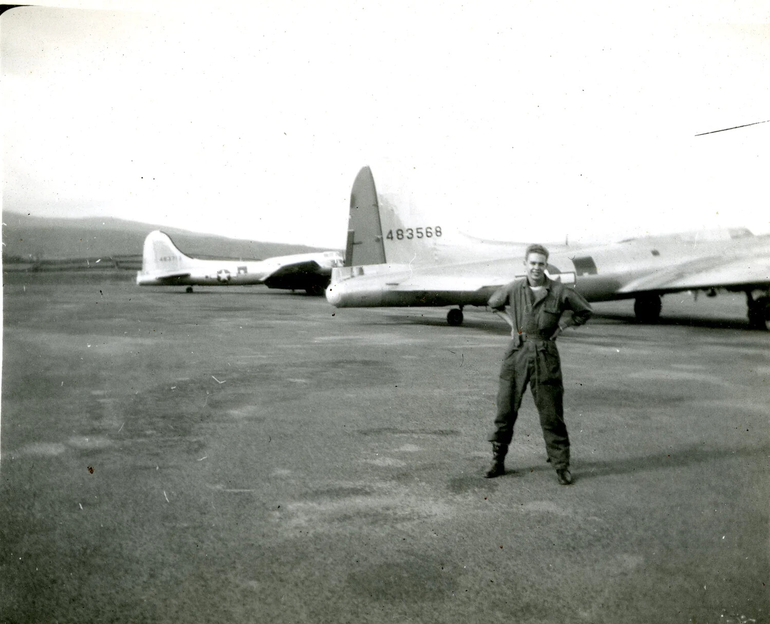Airman Posing Before B-17 Flying Fortress Bombers, Postwar 1946