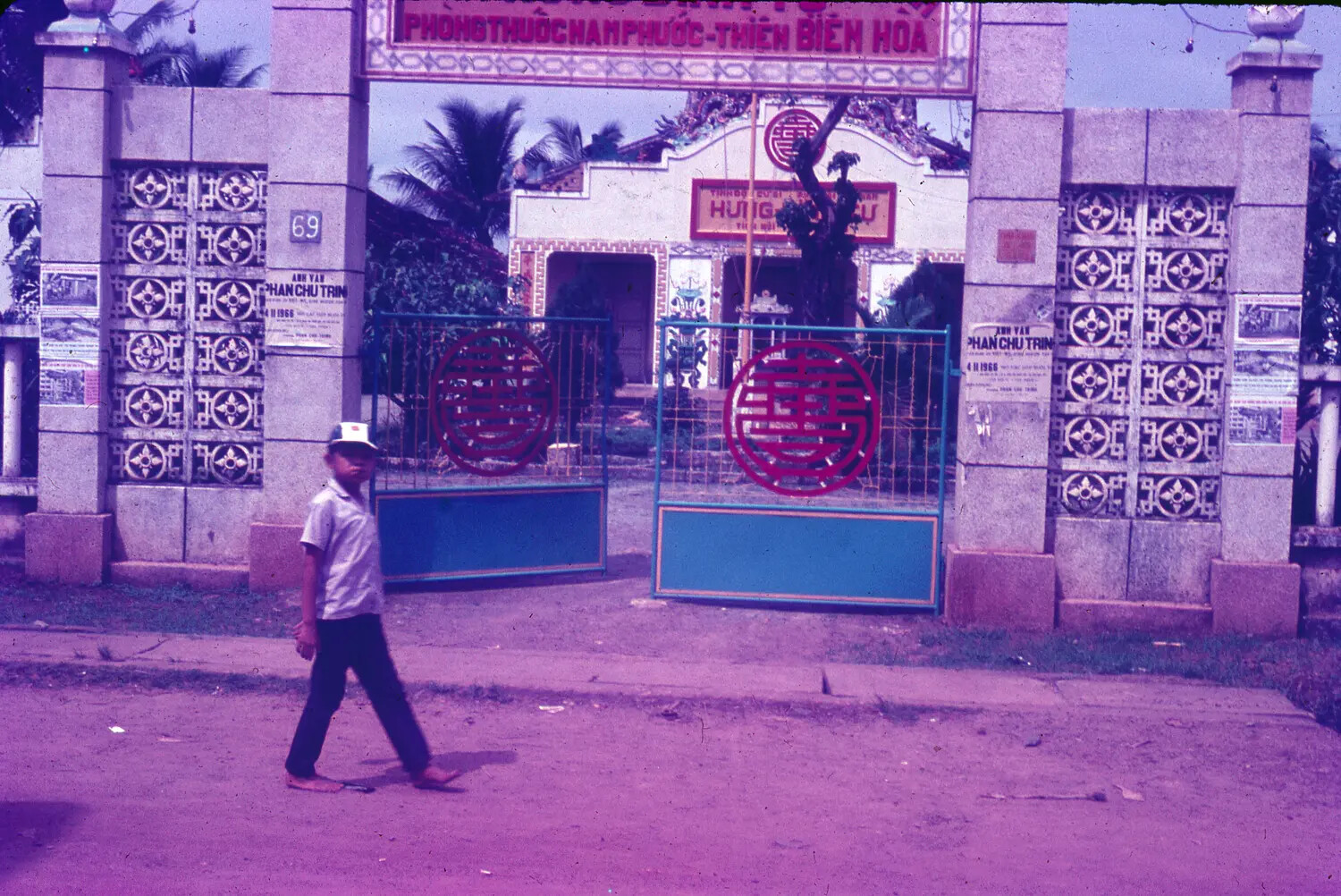 Temple Gate and Street Scene near Bien Hoa Air Base, South Vietnam, 1965