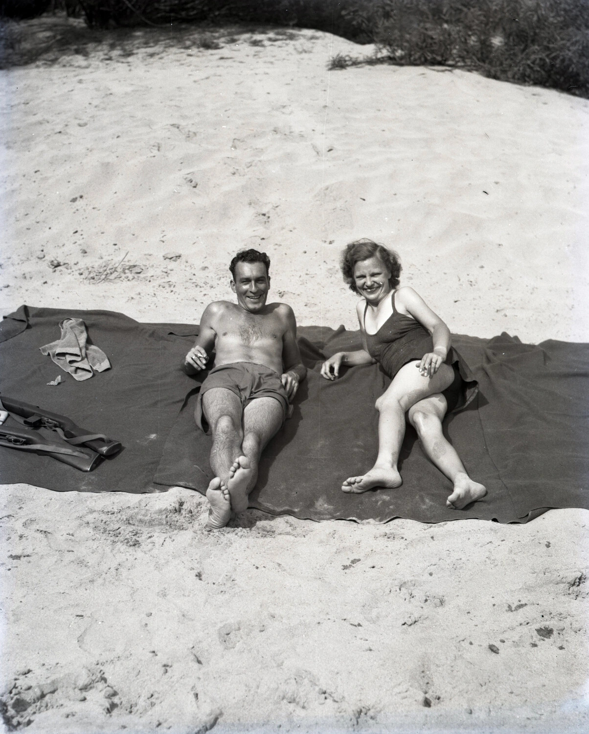 Off-Duty Couple on Riverbank Blanket with Sidearm, CBI Theater, WWII