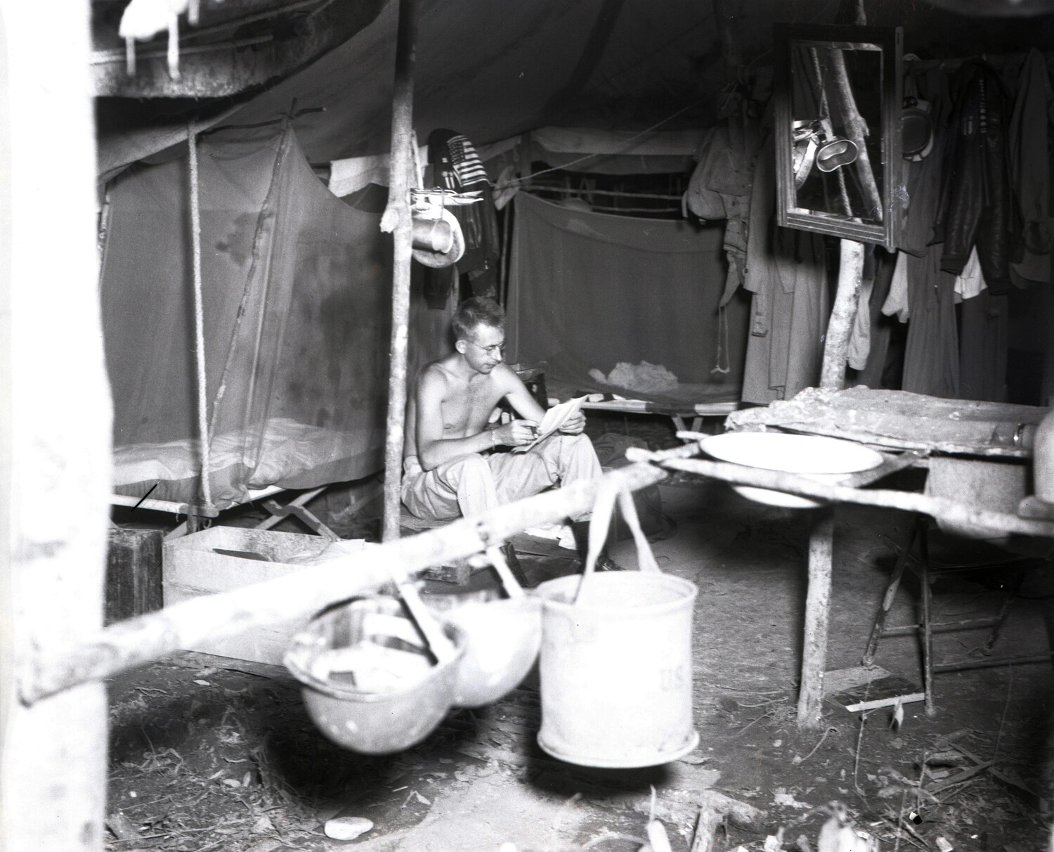 Serviceman Writing a Letter in Tent Quarters, CBI Theater, WWII