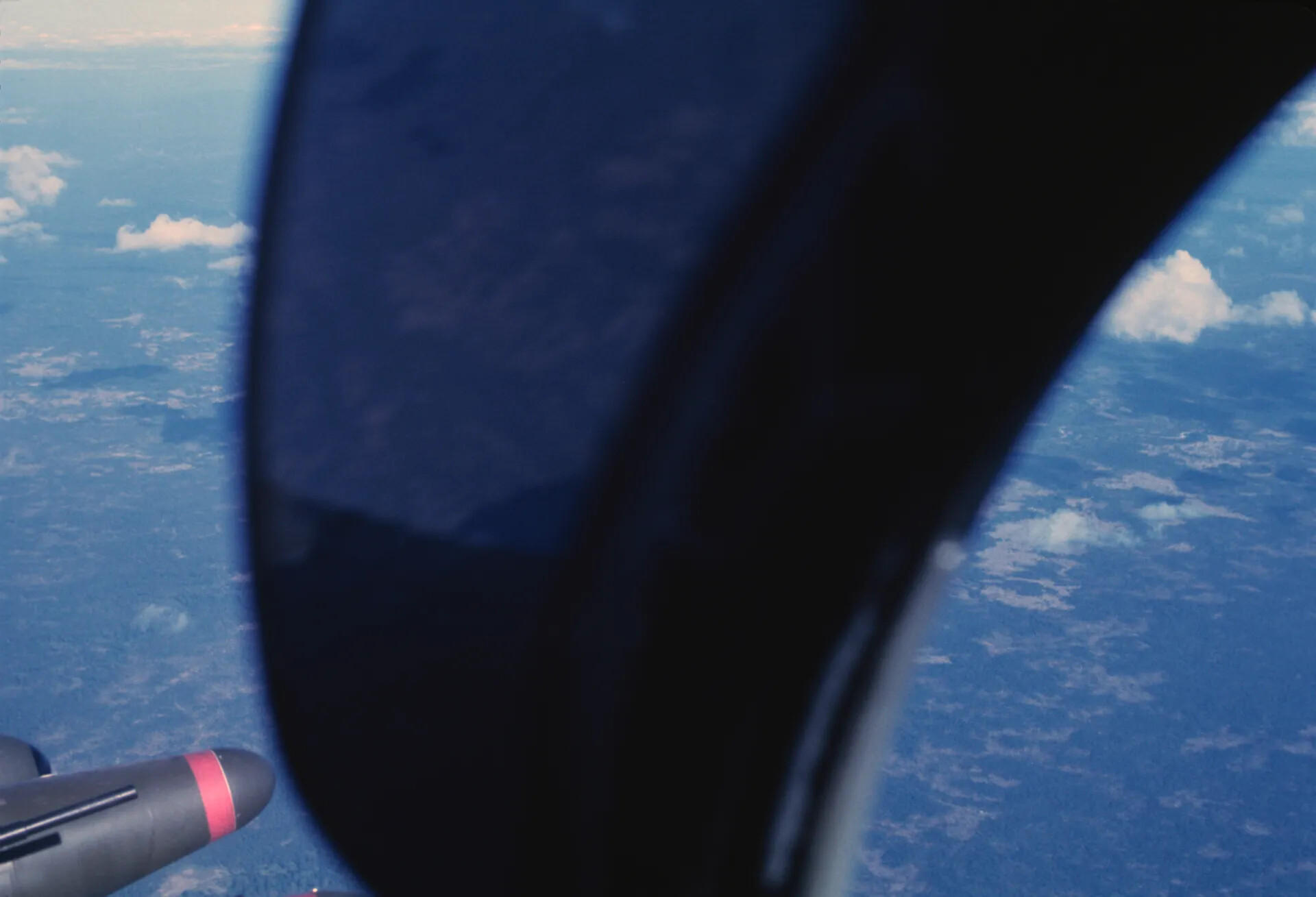 In-Flight View of Propeller Blur and Underwing Ordnance from A-1 Skyraider Cockpit
