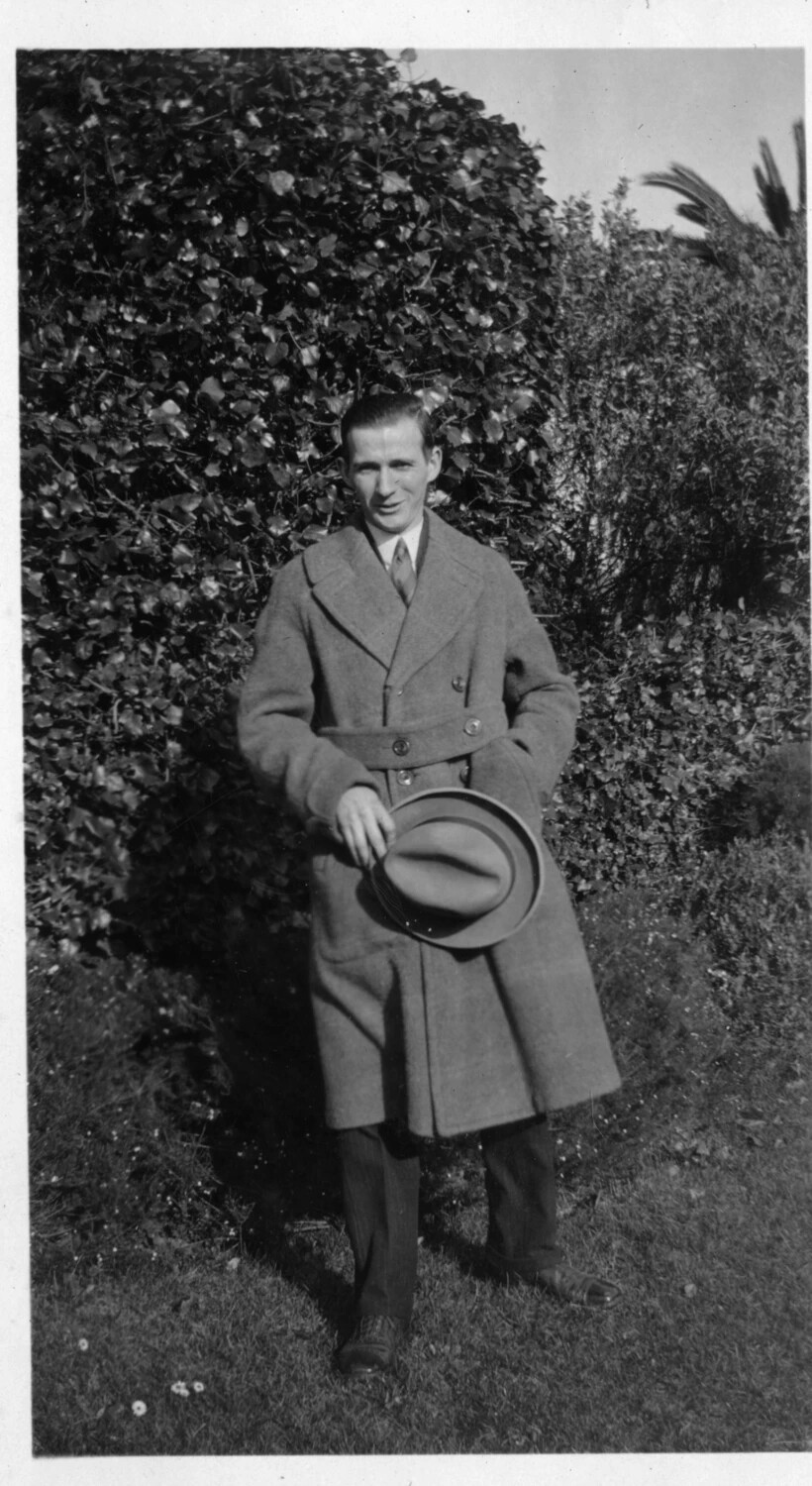 Young Man in Overcoat Holding Fedora, Garden Portrait, c. late 1920s–early 1930s