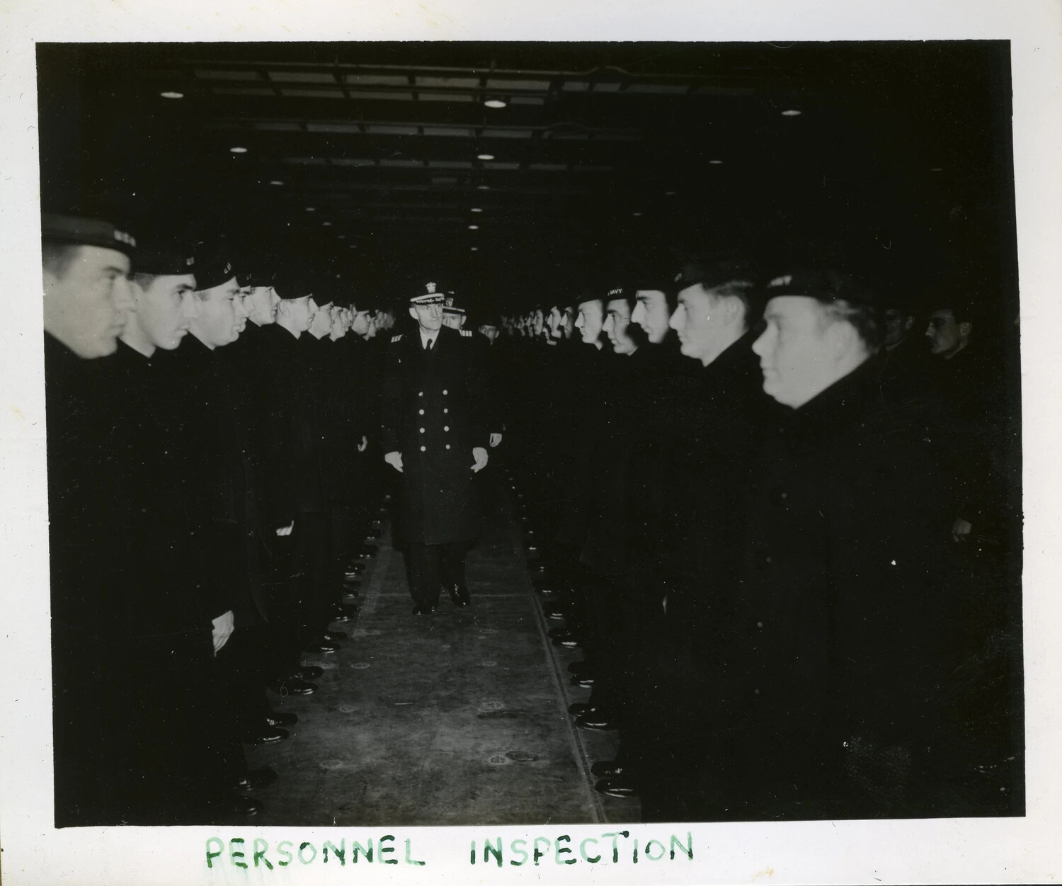 Personnel Inspection in Hangar Bay, USS Franklin D. Roosevelt (CVB-42)