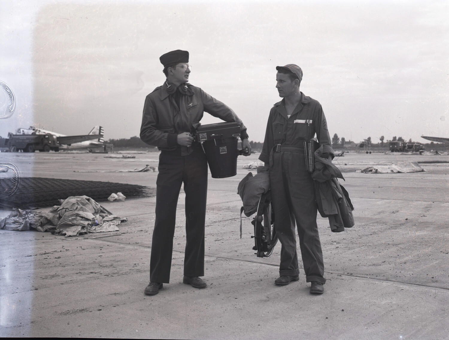 Two Airmen with Flight Gear on CBI Theater Airfield Ramp, WWII