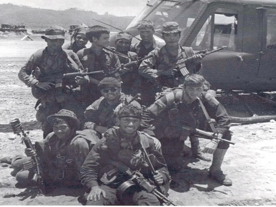 MACV-SOG Reconnaissance Team Group Portrait with UH-1 Helicopter