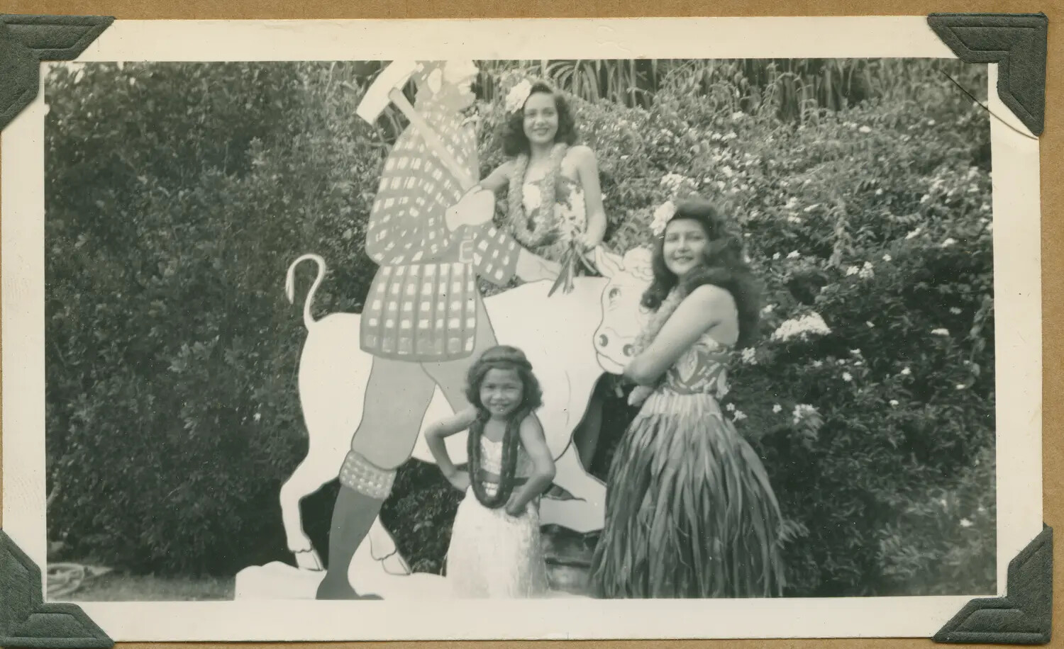 Hula Performers with Minnesota Day Cutout Display, University of Hawaii, March 7, 1943 (Enlarged View)
