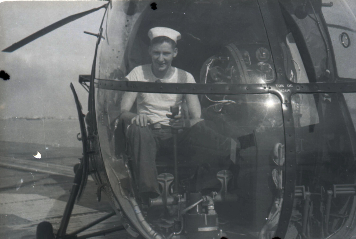 U.S. Navy Sailor in Plane-Guard Helicopter Bubble Canopy Aboard USS Yorktown, 1953