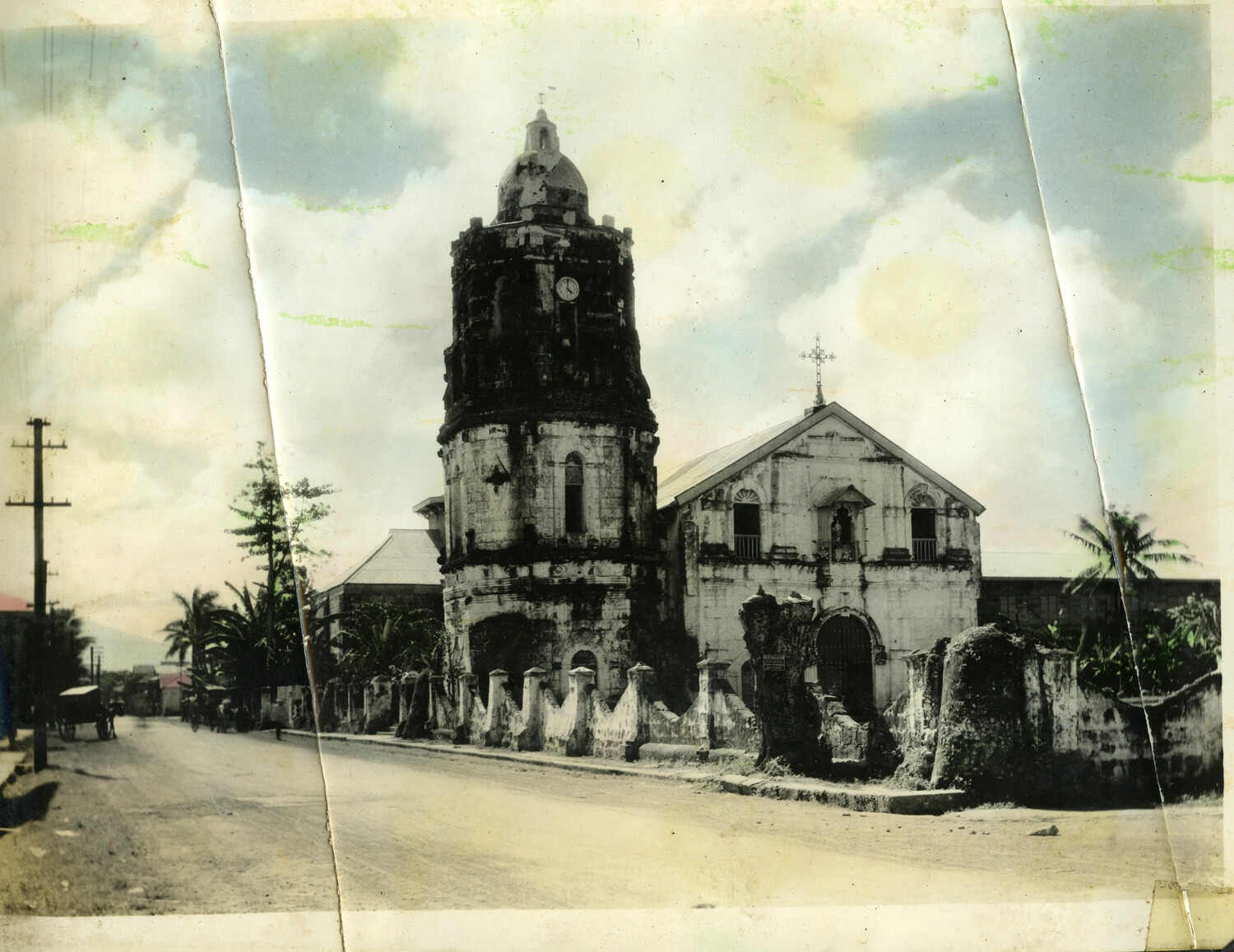 Hand-Tinted Photograph of a Philippine Colonial-Era Stone Church with Round Bell Tower and Clock, Provincial Street Scene