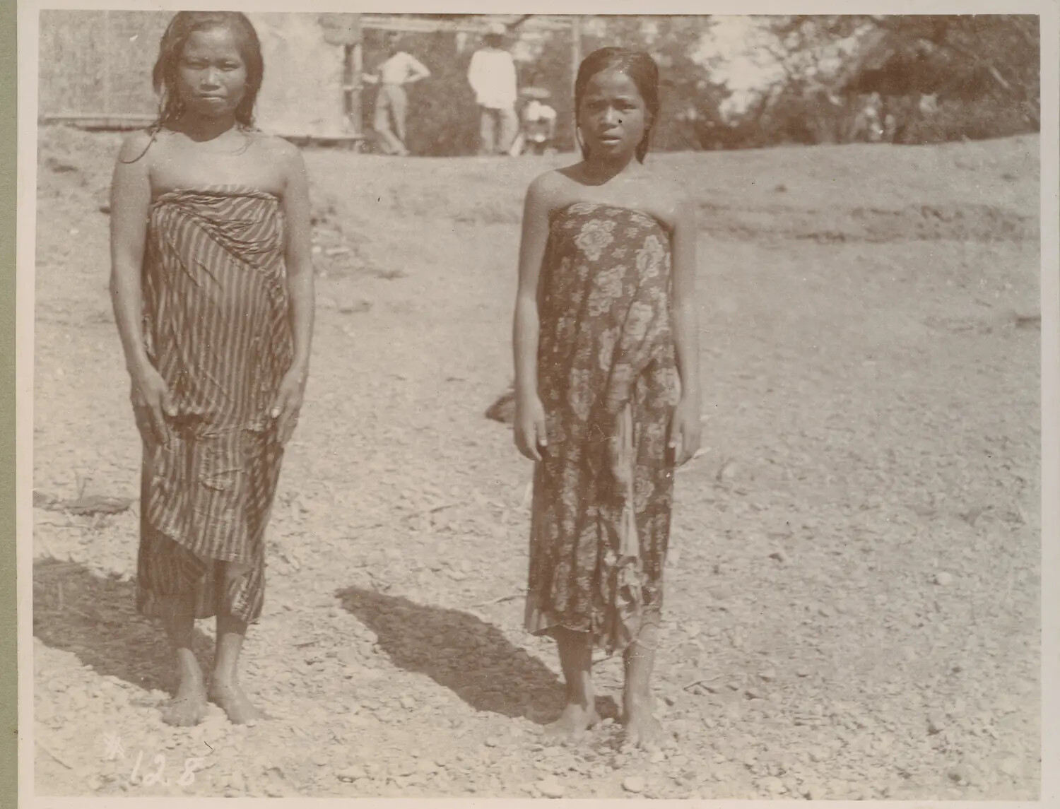 Two Young Filipino Women in Traditional Wrapped Tapis, Philippines, c. 1890s-1900s