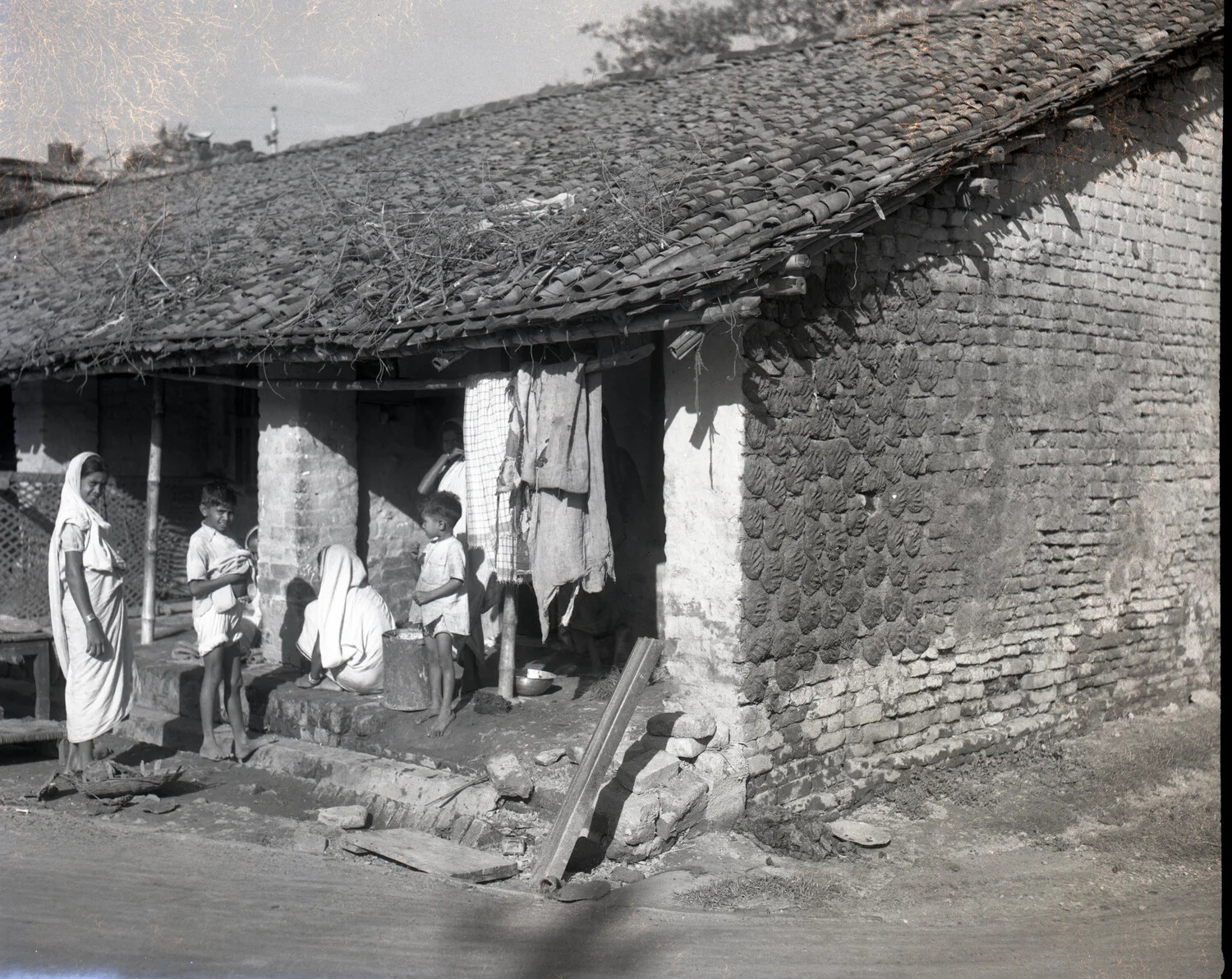 Rural Village House with Family, India, China-Burma-India Theater, WWII Era