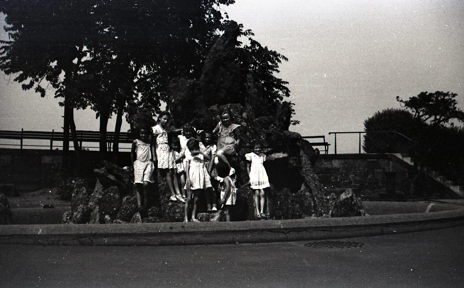 Group of Girls Playing on Park Rock Garden, c. 1940s