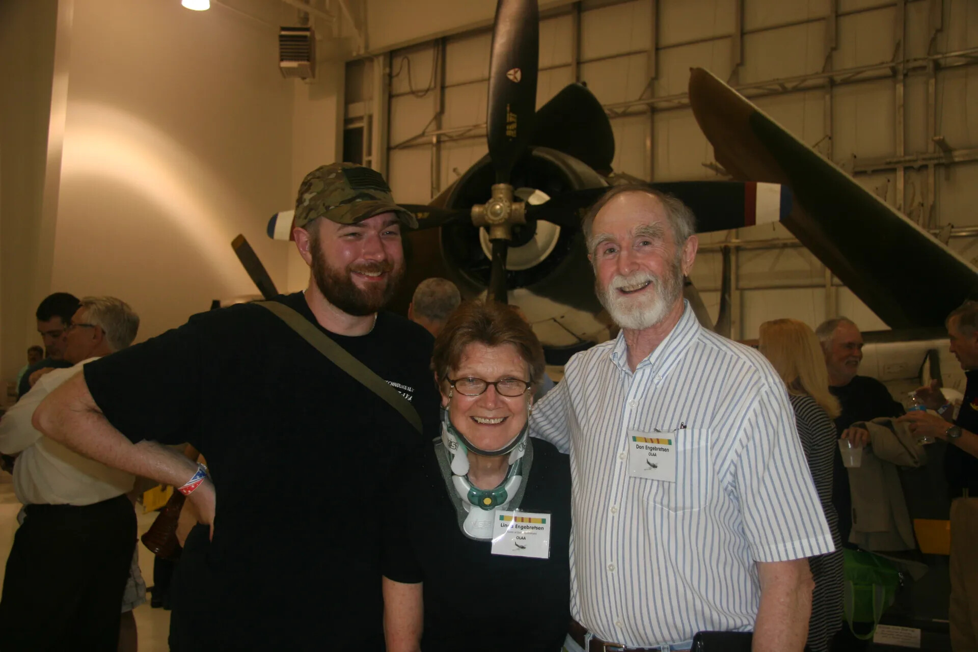 Don and Linda Engebretsen with Family Member at Operation Tailwind Reunion, Aviation Museum Hangar, 2016