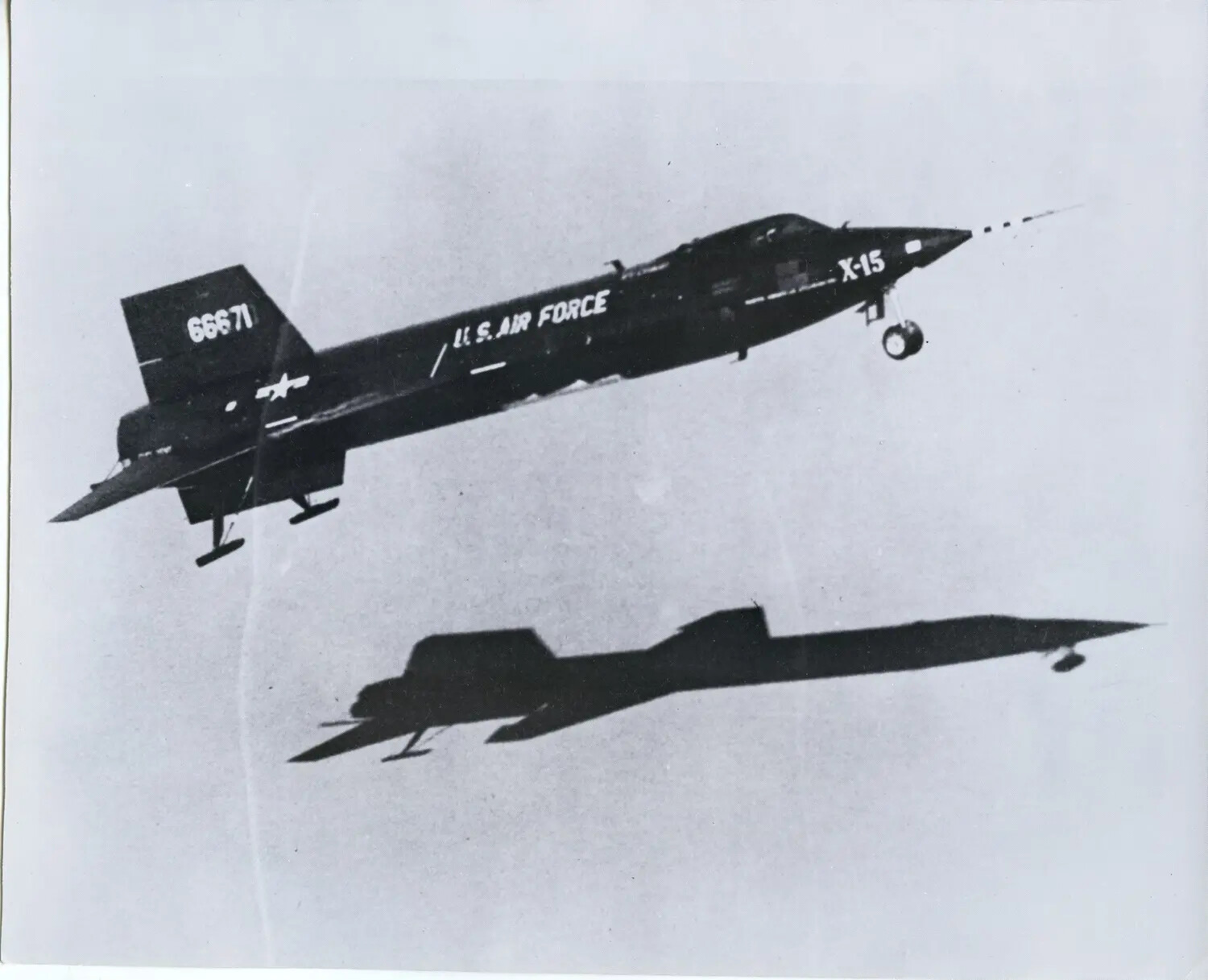 North American X-15 Rocket Research Aircraft (56-6671) in Flight with Cloud-Deck Shadow