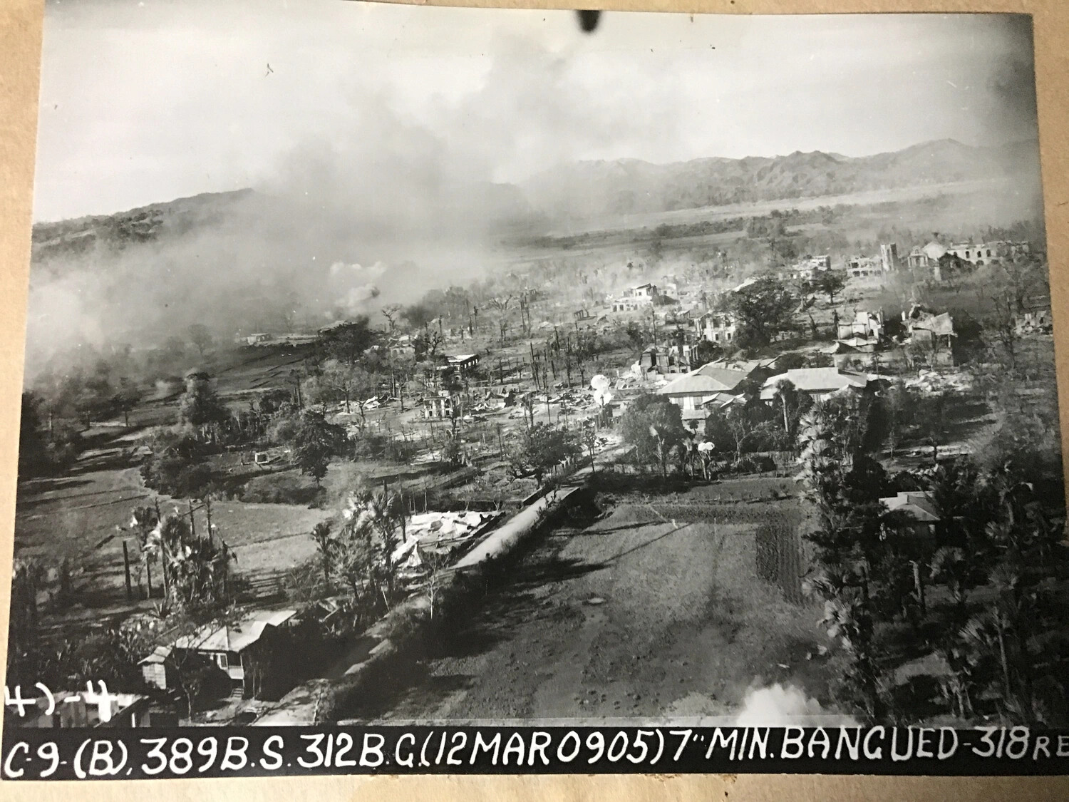 Strike Photograph: 389th Bomb Squadron Attack on Bangued, Abra Province, Philippines, 12 March 1945