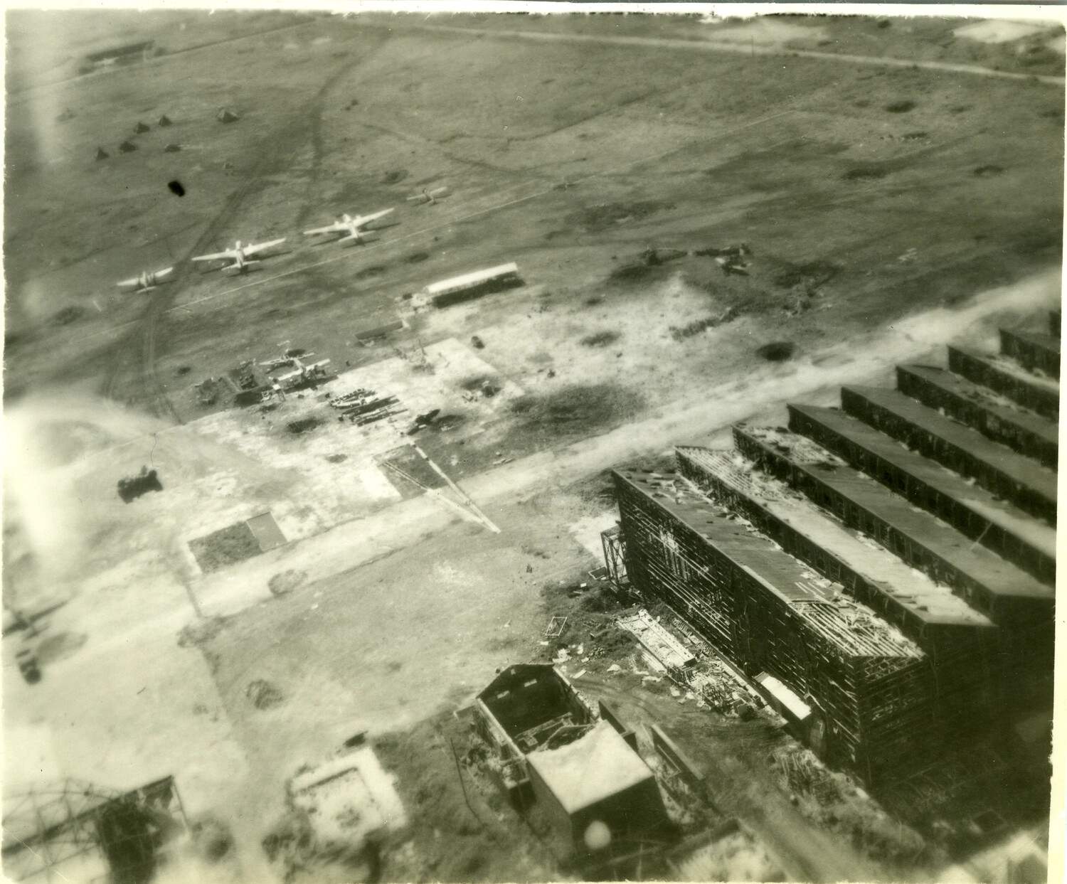 Aerial Reconnaissance Photograph of a Damaged Japanese Airfield, Okinawa, 1945