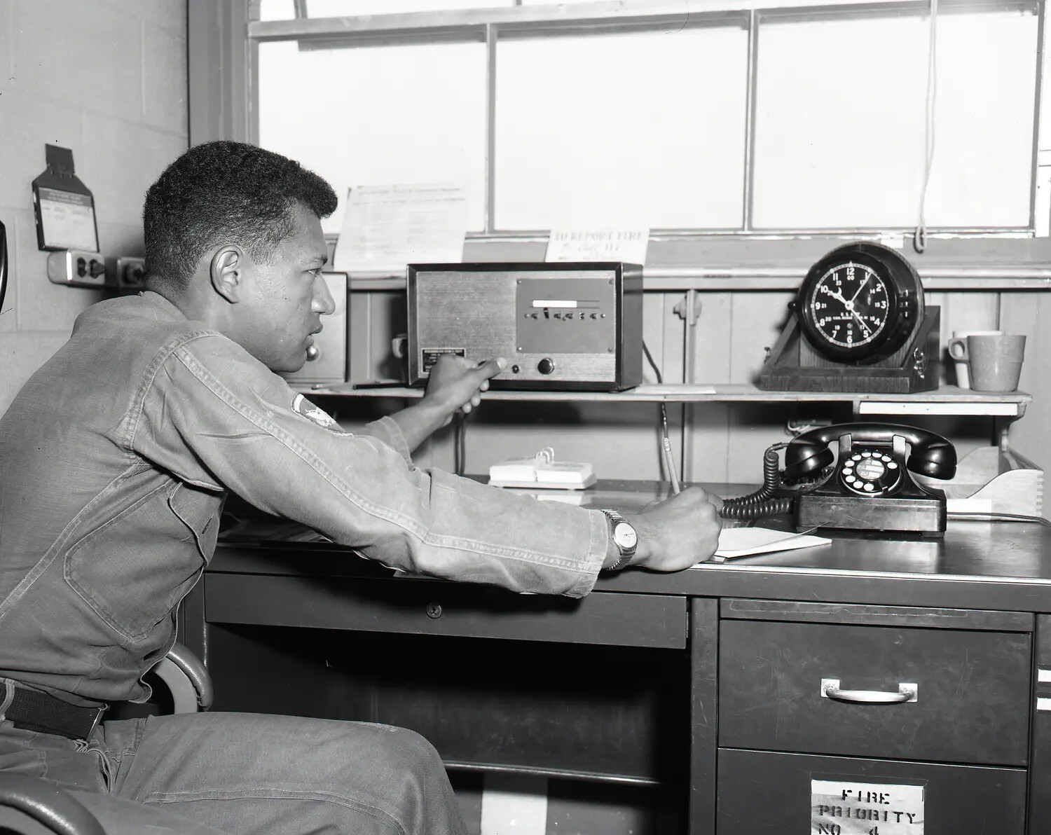 National Guard Serviceman at Radio Communications Desk, Base Operations Office