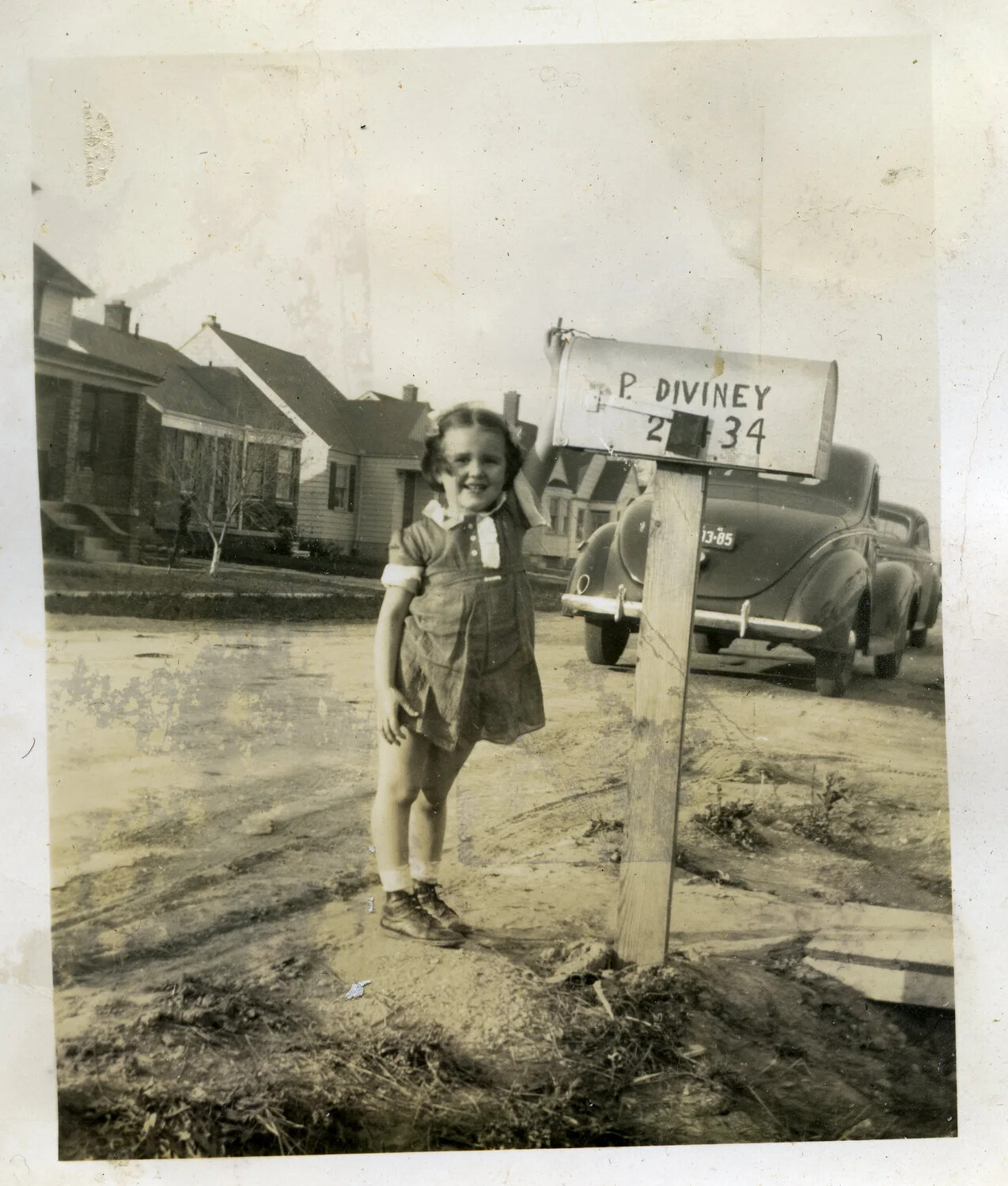 Family Snapshot: Young Girl by the "P. Diviney" Mailbox, Home Front, WWII Era