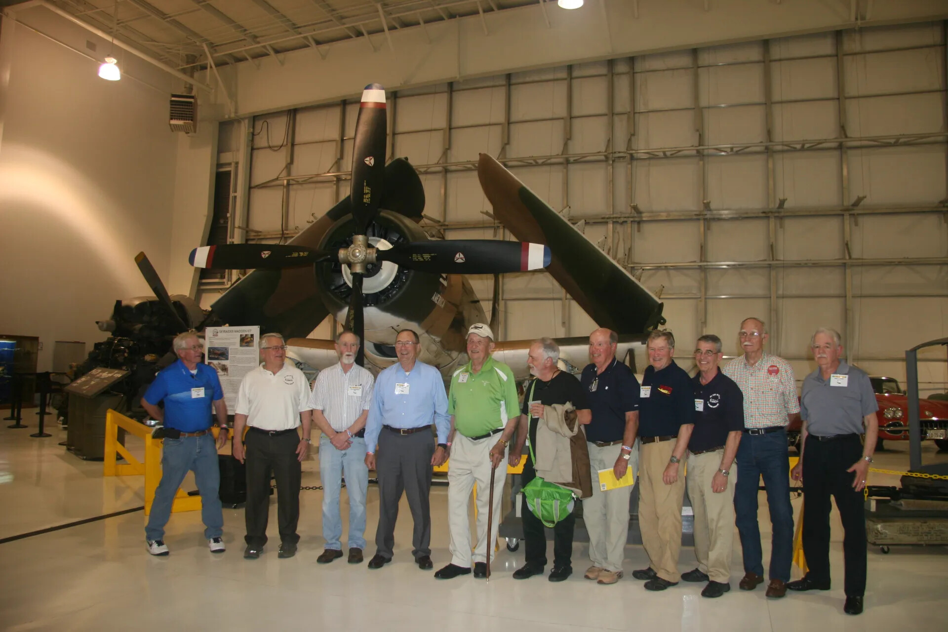 Eleven-Man Group Photo Beneath A-1 Skyraider 'AMERICA', Alternate Angle