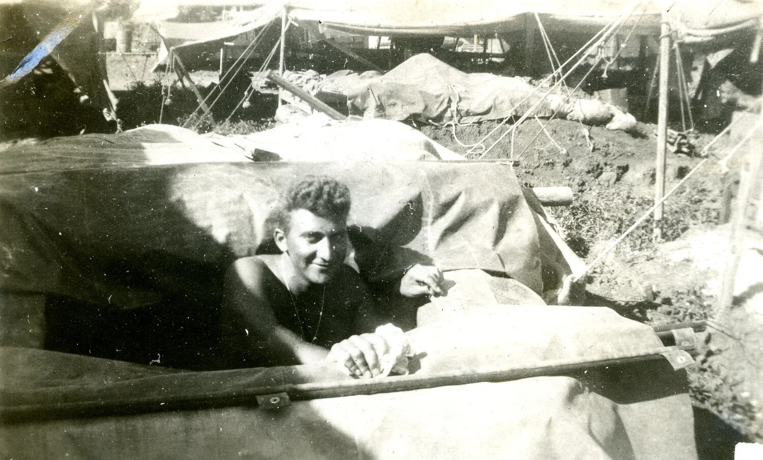 Serviceman in Foxhole Shelter, Ie Shima, 345th Bomber Group Photo Album, WWII