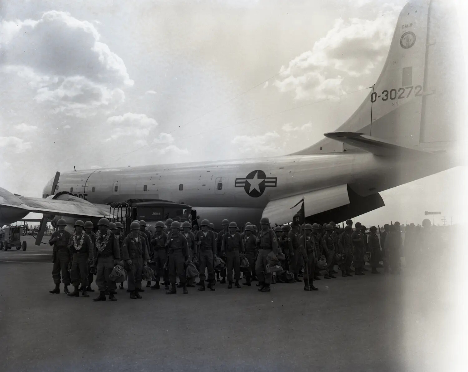 National Guard Troops Formed Beside a California Air National Guard C-97 Stratofreighter