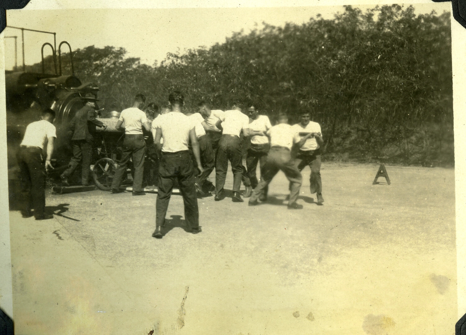 Gun Crew Moving Artillery Piece with Marker Stake in Foreground, Manila Area, Philippines, c. 1930s–1940s