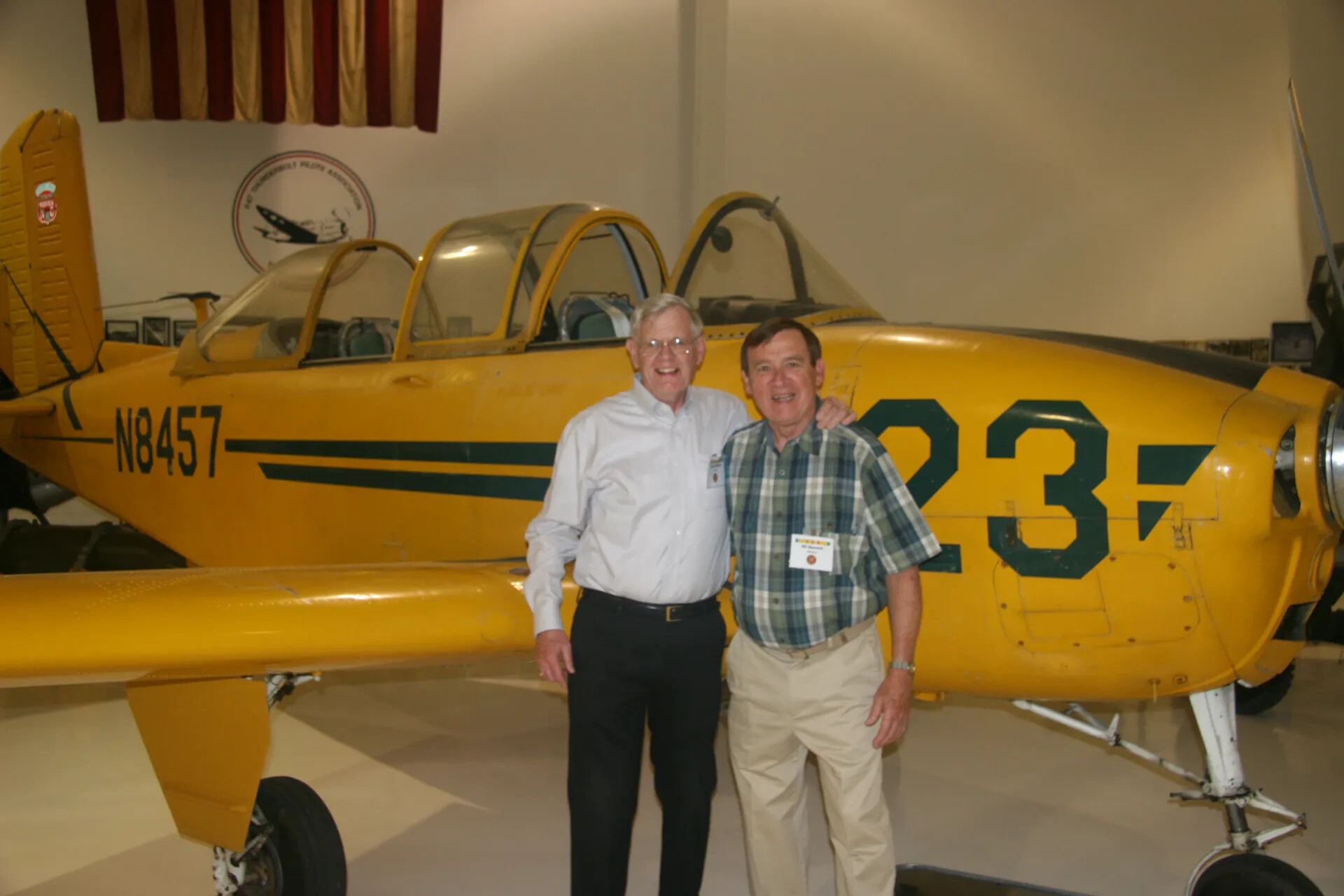 Reunion Photograph with Vintage Trainer Aircraft (N8457), 2016 Operation Tailwind Gathering